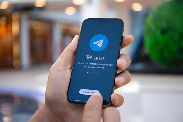 Telegram app is opened on the phone